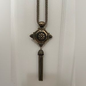 Free people Brass pendant on olive green rope